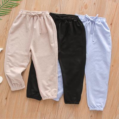 China New QUICK DRY Kids Sports Pants Summer Sun Protection Solid Boys And Girls Harem Long Pants for sale