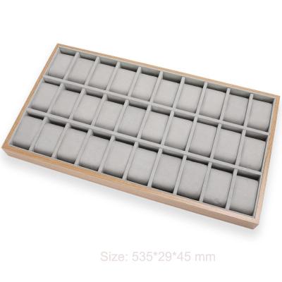 China Wooden counter display tray bracelet storage tray jewelry display watch watches are placed in rows of props watch rack. for sale