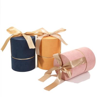 China Custom Reused Materials Logo Small Eco Friendly Cosmetic /Candel/Flower Packaging Box With Ribbon Bowknot Around Cylinder Craft Paper Tube for sale