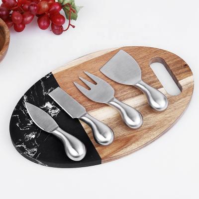 China Wholesale Price Kitchen Sustainable High Quality Oval Wooden Splicing Cheese Cutting Board Marble Board for sale