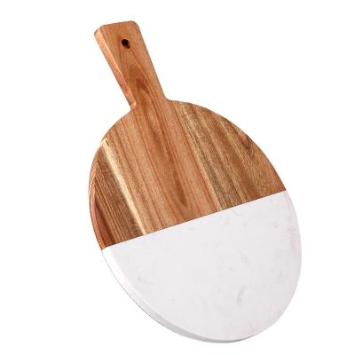 China Good Quality Kitchen Tableware Viable Round Wood and White Marble Cheese Cutting Board Cutting Board With Handle for sale