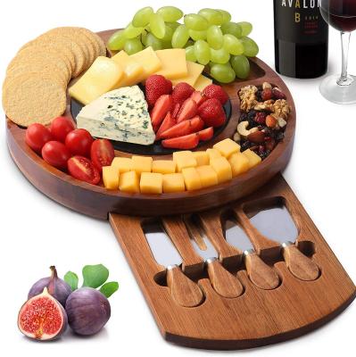 China Disposable Just A New Arrival Round Acacia Wood Cheese Board With Double Sided Slate Board And 4pcs Cheese Tools for sale