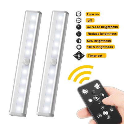 China Minimalist Remote Control Led Rechargeable Battery Operated Kitchen Motion Sensor Light Stick On Wall Dimmable Home Light With Sensor for sale