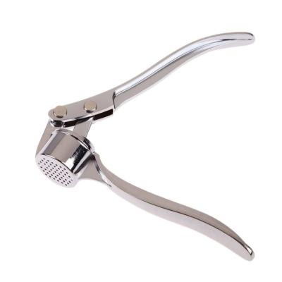 China Sustainable Hand Held Stainless Steel Garlic Grinder Ginger Squeezer Masher for sale