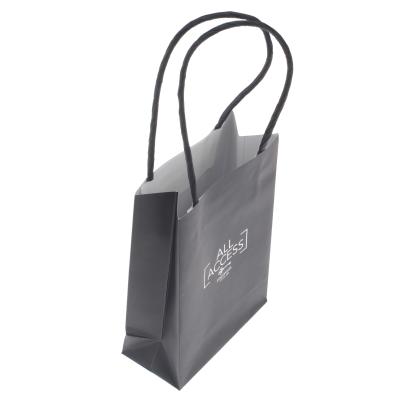 China Recyclable Wholesale Custom Printed Black Luxury Shopping Paper Gift Bag With Handle for sale