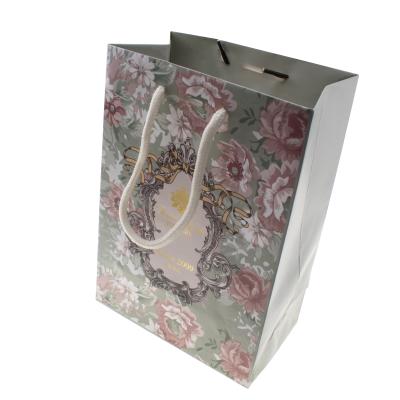 China Recyclable high quality custom logo printed art paper gift bags craft paper bag paper shopping bag for sale