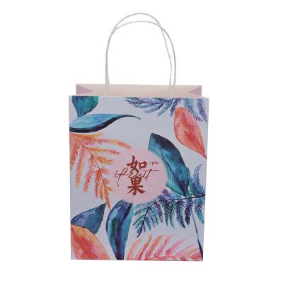 China Custom Recyclable Shopping Bag Paper Gift Bags With Logo White Reusable Kraft Paper Fabric Shopping Bag for sale