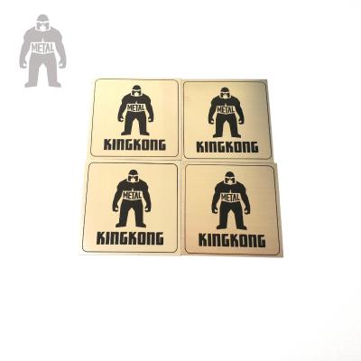 China Small Logo Adhesive Metal Label Plates Bag Accessories Brand Laser Out Sew Label for sale