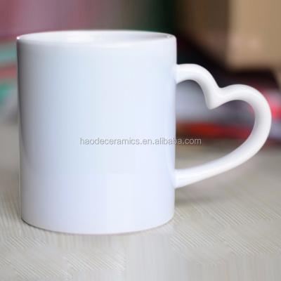 China 11oz Sublimation Viable White Empty Heart Handle Ceramic Mug Love Mug for sale