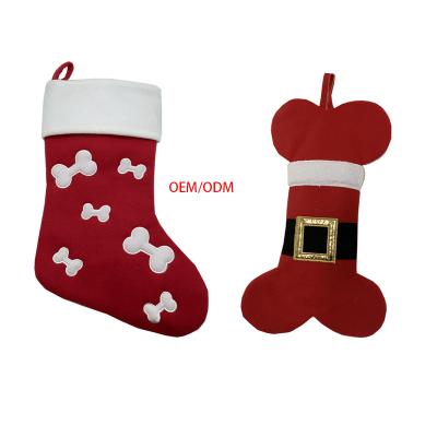 China TRUSUSTIC Embroidery Gift Hot Sale Promotional Sales Personalized Plush Bone Shape Dog Christmas Red Stocking Holder for sale