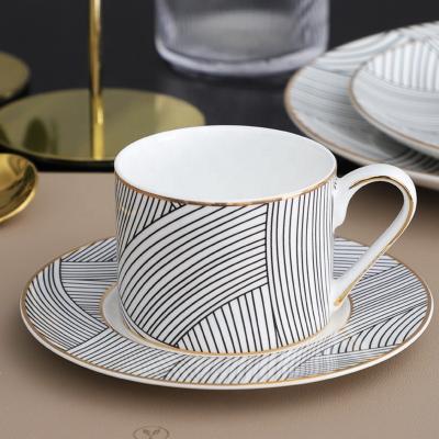 China Amazon Stocked Custom Printing Ceramic Tea Cup And Saucer Set Porcelain Black Coffee Cups With Dish for sale