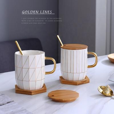 China Amazon Hot Selling Stocked Ceramic Coffee Mug With Gold Hand Lid Gold Wood Line Tea Cups With Wood Tray for sale