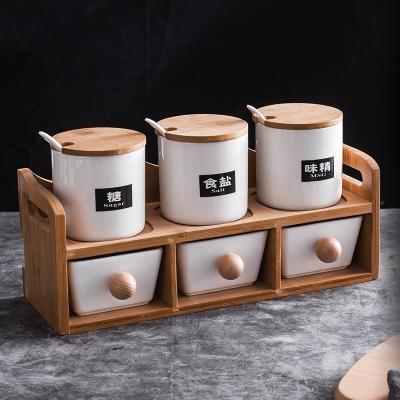 China Nordic Stocked Kitchen Porcelain Sugar Caddies Custom Design Ceramic Salt Pepper Spice Sugar Jar With Wooden Tray for sale