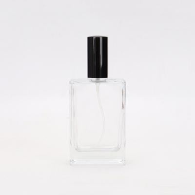 China Personal Care Flat Square Clear Glass Perfume Bottle 15ml 30ml 50ml 100ml for sale