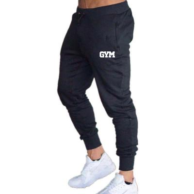 China Anti-Static Jogging Pants Men Sport Soft Cotton Bodybuilding Joggers Gym Pants Men Running Pencil Pants Men for sale