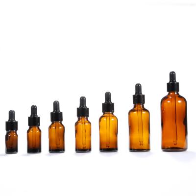 China Amber 10ml cosmetic 1 oz essential oils glass bottles with glass eye droppers for sale