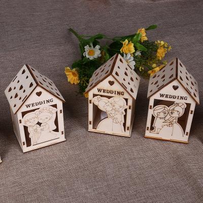 China Small Wooden Snowman House Bright Europe Craft Lighting Ornaments Wood Home Decoration for sale