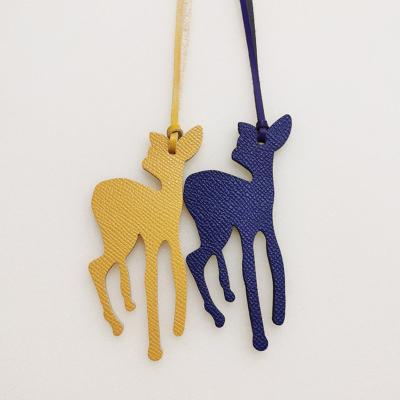 China Cute bag hanger letter charm deer ornaments for women leather handbag brand luxury bag pendant for ladies backpack bag charm accessories ornament women for sale