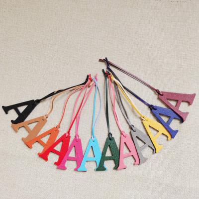 China Bag Hanger Letter Charm A To Z Letter Charm Accessories Ornament Cow Leather Character 21 Alphabet Key Chain Pendant For Women Backpack for sale