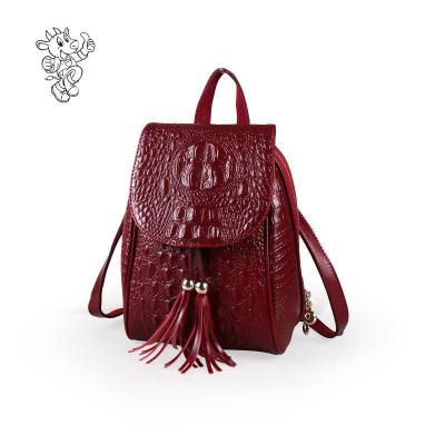 China New Fashion Female 2019 Leather Backpack Style Crocodile Pattern Tassel Leather Backpack Handbag For Women for sale