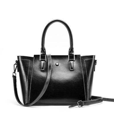 China 2020 fashion newcomers design trapeze style large capacity genuine leather women's handbags and purses for sale