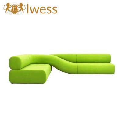 China Creative designer shaped corner 7-shaped sofa simple modern light luxury irregular fabric design sofa for sale