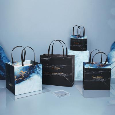 China Recyclable Eco Friendly Wedding Anniversary Packaging Black Gold Luxury Gift Bag Custom With Your Own Logo for sale