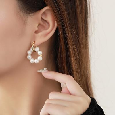 China 2021 Fashion New S925 Sterling Silver Earrings Female Retro Light Luxury Pearl Earrings Cold Wind Circle Fashion for sale