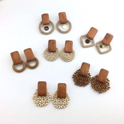 China Fashionable new retro style personality long earrings ladies jewelry simple wooden wholesale for sale