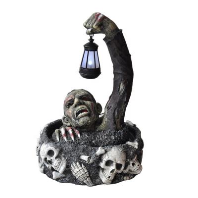 China Europe Resin Outdoor Figurine Lights Sinister Skeleton Stake Led Solar Lantern Halloween Decoration for sale