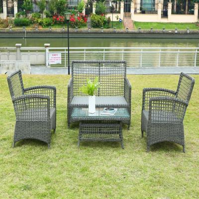 China Modern Outdoor Handmade Wicker Patio Sofa Set 4 Seater Sofa With Rattan Sofa Modern Garden Furniture Luxury Wicker Table for sale