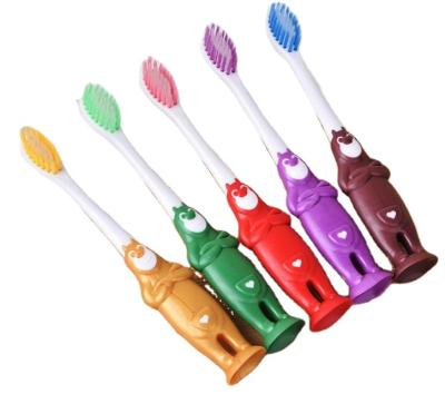 China OEM ODM Food Grade Disposable Plastic Handle Children Kids Clear Rubber Toothbrush With Customized Logo for sale