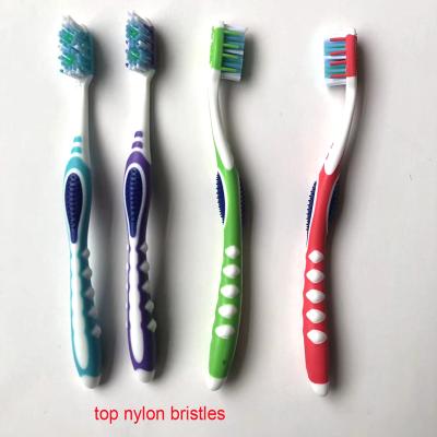 China OEM Disposable High Quality Soft Bristle Plastic Toothbrush With Rubber Adult Toothbrushes Oral Wholesale for sale