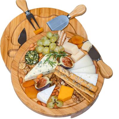 China Sustainable Bamboo Cheese Board With Four Sets Of Knives Cheese Board Bamboo Cutting Board for sale