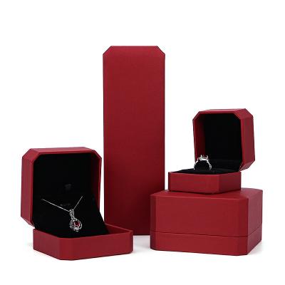 China Red Jewelry Box Pendant Ring Pendant Bangle Bracelet Necklace Octagon Shape Jewelry Packaging Paper Jewelry Box for sale