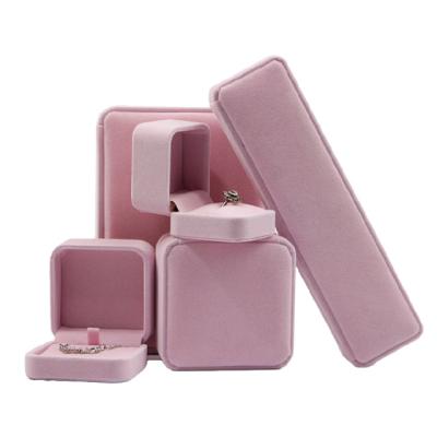 China Jewelry Packaging Pink Color Round Corner Jewelry Velvet Customized Bracelet Elegant Ring Box Package Full Velvet Jewelry Set for sale