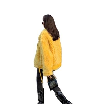 China New fashion anti-shrink sheepskin coat leather winter warm outwear loose real sheep fur coat for women with belt for sale