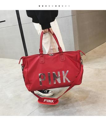 China New Multifunctional Tote Luggage Travel Sports Gym Yoga Bag With Pink Letters Large Capacity Oxford Cloth Travel Bag for sale