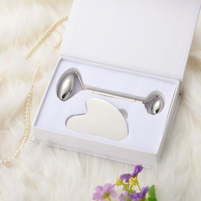 China Skin Tightening Facial Scraping Roller Gua Sha Massage Tool Kit Custom Stainless Steel Body Metal Facial Massager for sale