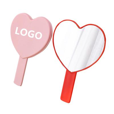 China Custom Logo Beauty Table Small Heart Shaped Hand Held Hand Held Custom Make Up Cosmetic Hand Makeup Mirrors for sale