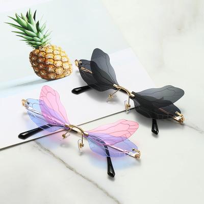 China 2021 Diamond Butterfly Wings Sunglasses Metal Frame Luxury Fashionable Rimless Rimless Shades Frameless Sunglasses for sale