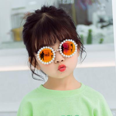 China 2021 New Luxury Smart Round Frame Children Bead Handmade Sunglasses Kids Sunglasses Shape Children's Sunglasses for sale