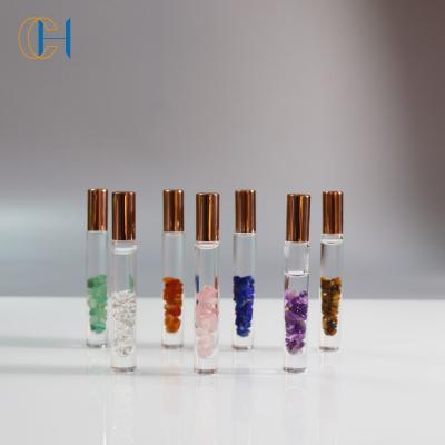 China New Design Luxury Modern Skin Care Natural Quartz Roller Gemstone Ball Essential Oil Roller Bottle for sale