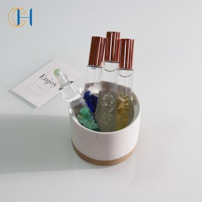 China Luxury Modern Wholesale Skin Care Nature Quartz Gemstone Roller Ball Essential Oil Roller Bottle for sale