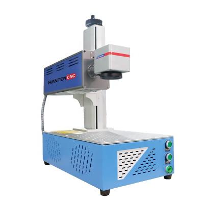 China Non Laser Marking RF Metal Tube CO2 Laser Machine 50W Desktop Metal Laser Marking Machine for sale