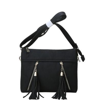 China Cute Tassel Zipper Pouch New Ladies Pinch Cross - Body Bags For Women for sale