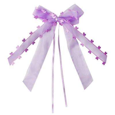 China Poliéster Cuero de organza de pelo Arcos cinta clips para hermosos accesorios de pelo de mariposa en venta