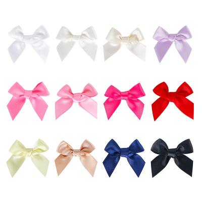 China Custom Pre Made Mini Self Adhesive Bows Satin Gift Ribbon Bow for Garment Accessory for sale