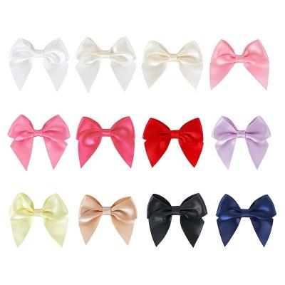 China Custom Handmade Garment Accessory Small Satin Ribbon Bow for Underwear Decoration for sale