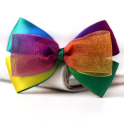 China Girls Christmas Hair Bow Accessories with Rainbow Satin Ribbon and Organza Material for sale